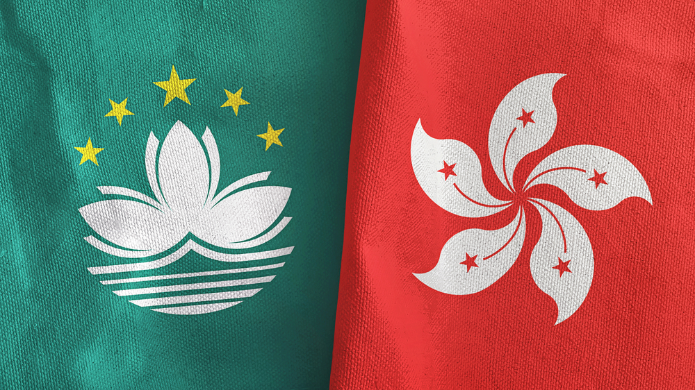 Hong,Kong,And,Macau,Two,Folded,Flags,Together,3d,Rendering