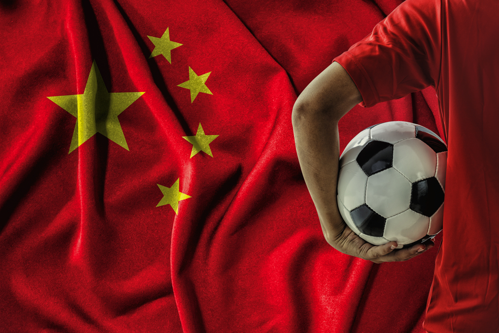 Soccer,Football,Player,On,China,Flag,Background